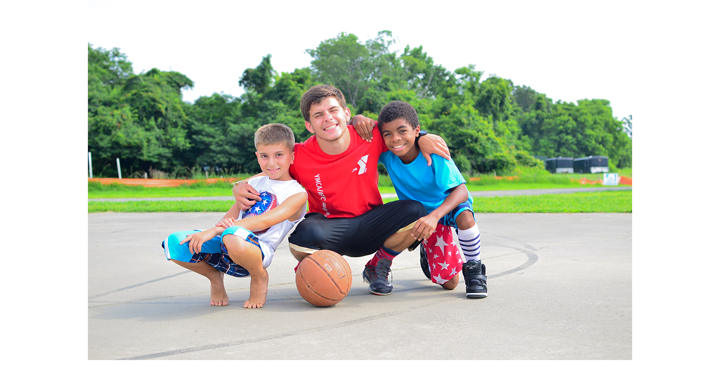 Camp counselor with two young children