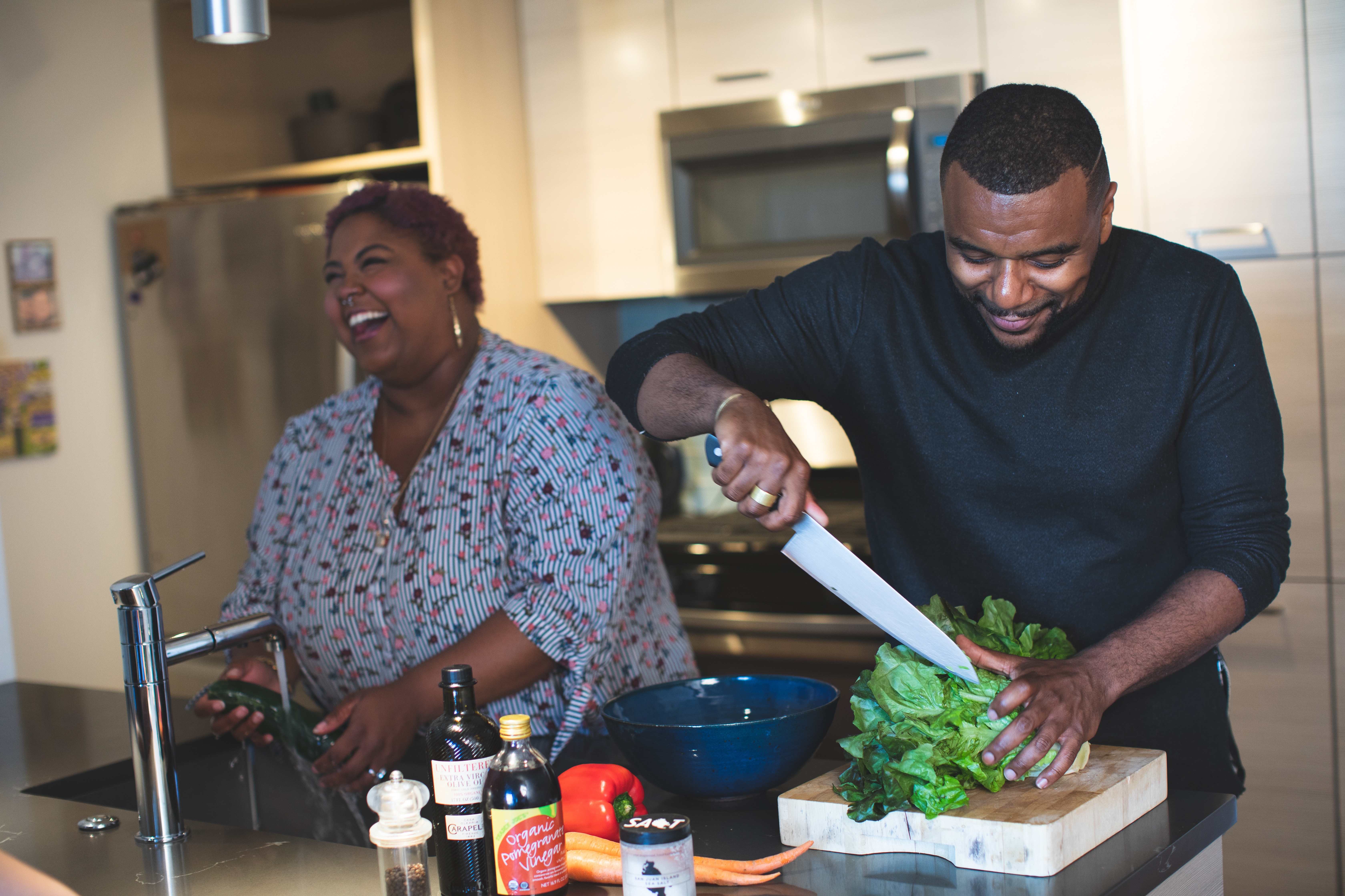 adult family cooking a healthy meaL