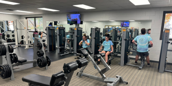 group of teens on the wellness floor working out