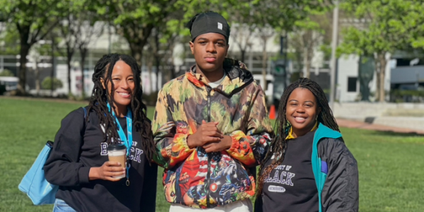 a group of teens smiling for the camera