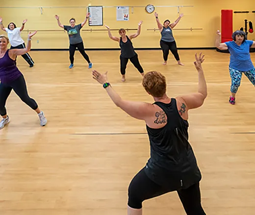 instructor at a class for group exercise