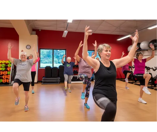 people working out in a group exercise class
