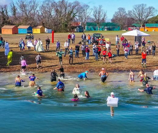 people running into river