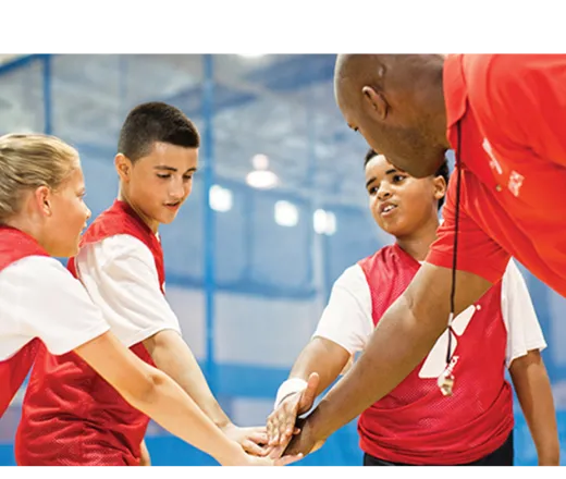 basketball coach with team