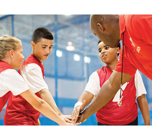 basketball coach with team