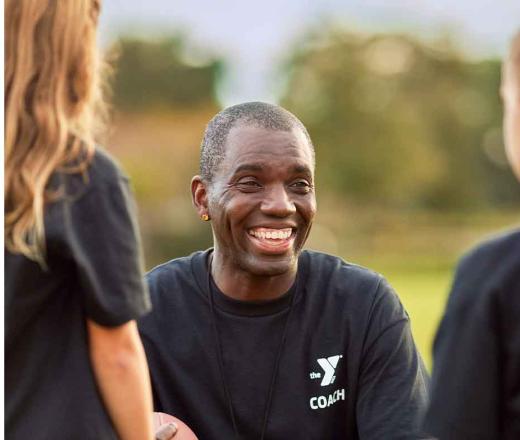 Coach talking to his players.