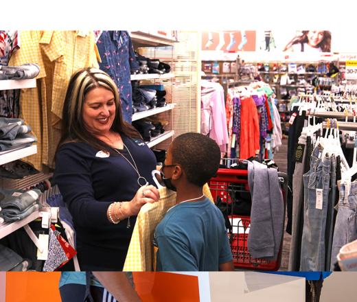 Bright beginnings volunteer helping kid shop.