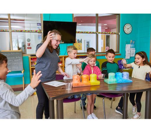 Kids doing a science experiment.