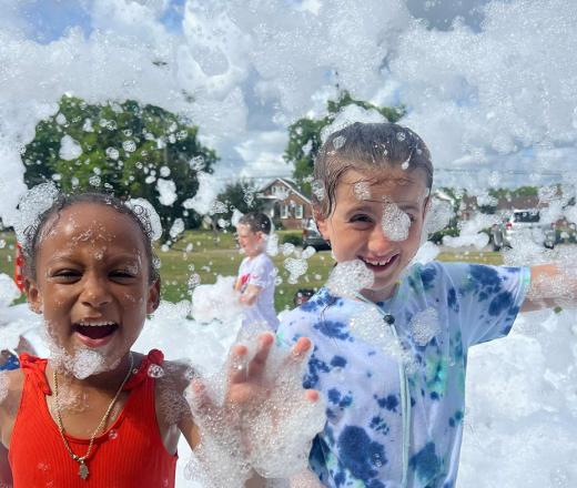 kids with bubbles outside
