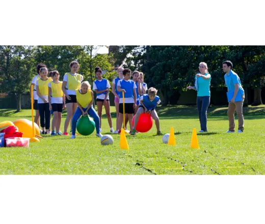 kids outside doing a relay race