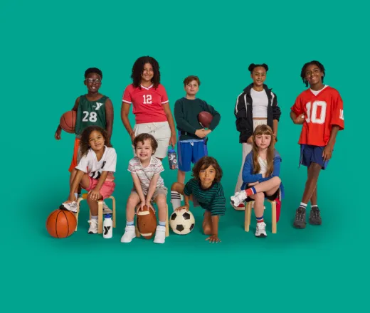 group of kids with sports equipment