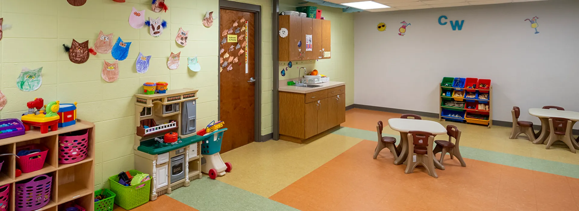 Child Watch with toys and tables for kids to play