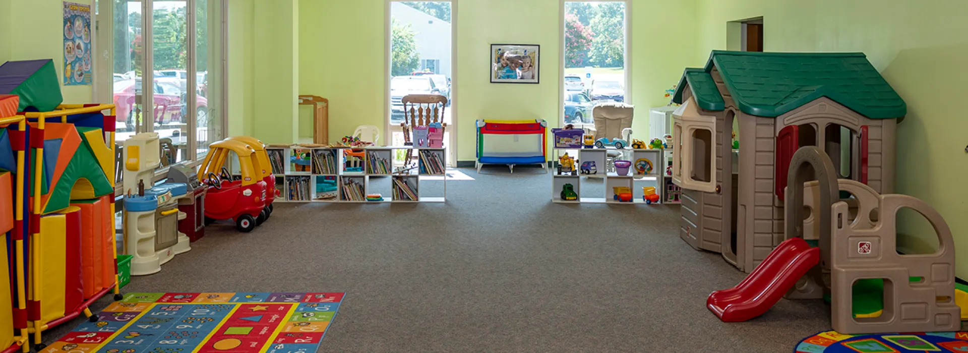 Child Watch area with toys for kids to play with
