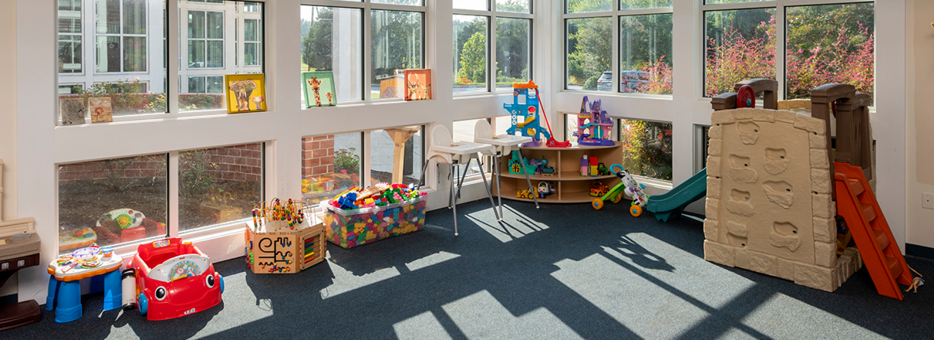 Child Watch area with toys for kids to play with